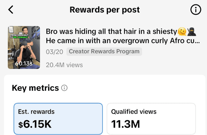 Barber creating content while cutting hair